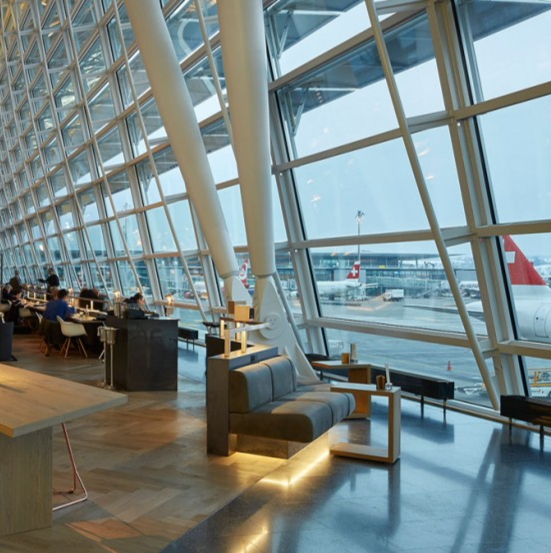 Travelers resting at Zurich Airport
